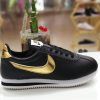 FB_IMG_1568462084374 Nike Cortez - Negras Gold