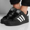 Superstar-preta-pe-1 Adidas SuperStar Negros